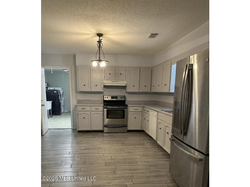 This expansive 5 bedroom, 3 bathroom, two story home offers the - photo 8