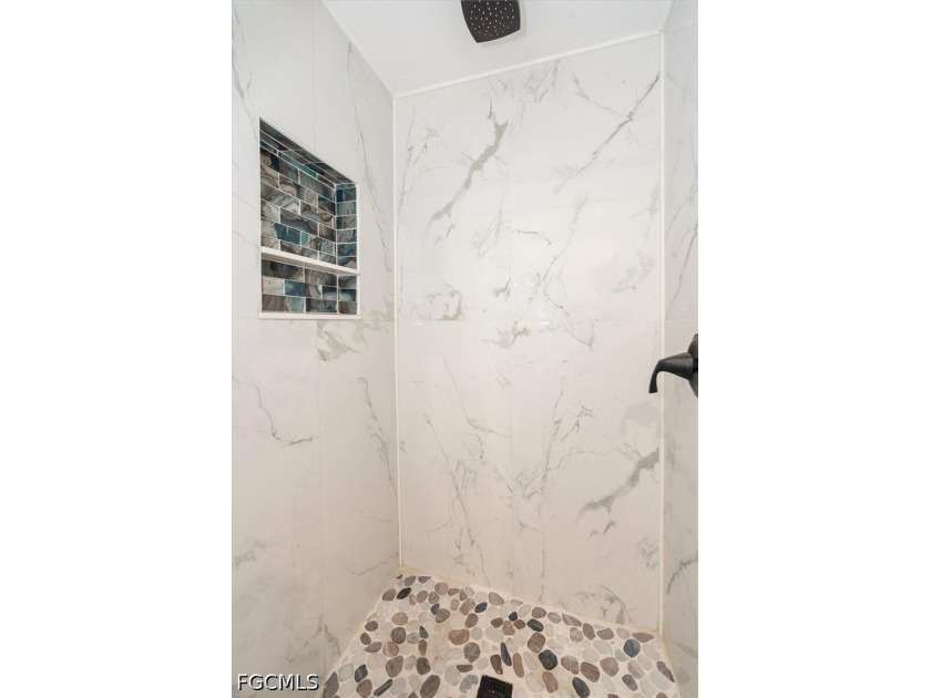 Welcome to this beautifully updated home in NW Cape Coral, where - photo 12