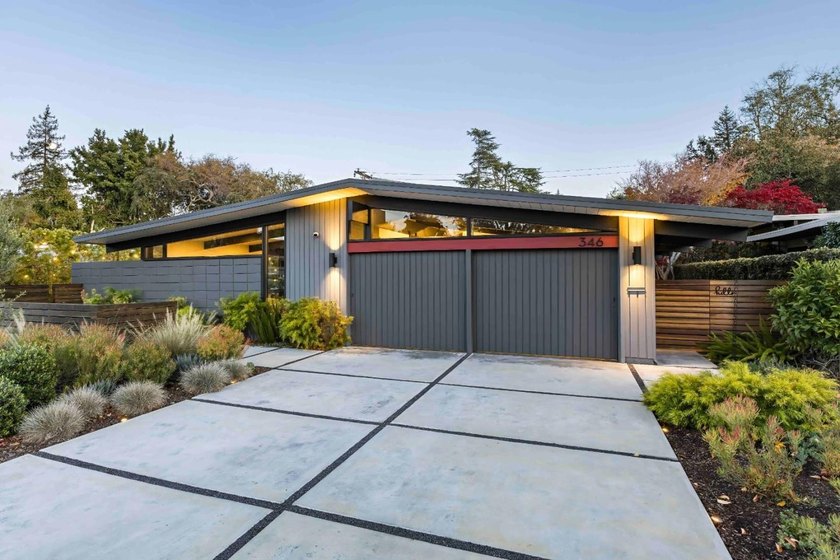 Completely renovated, this exceptional home blends iconic design - photo 2