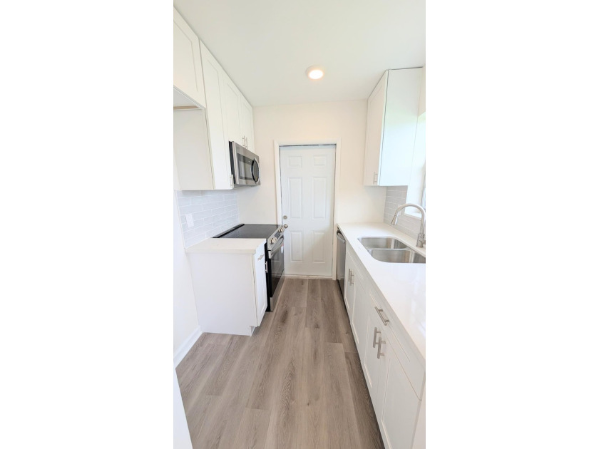 Don't miss this beautifully updated 2BR/1BA second-floor corner - photo 11