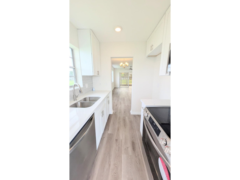 Don't miss this beautifully updated 2BR/1BA second-floor corner - photo 13