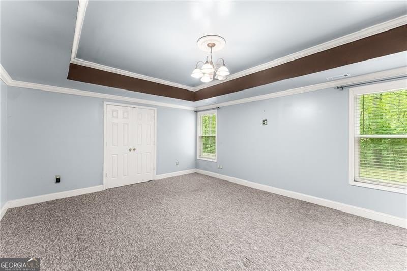 RARE OPPORTUNITY! Set on 4.4 private acres in one of Forsyth - photo 19
