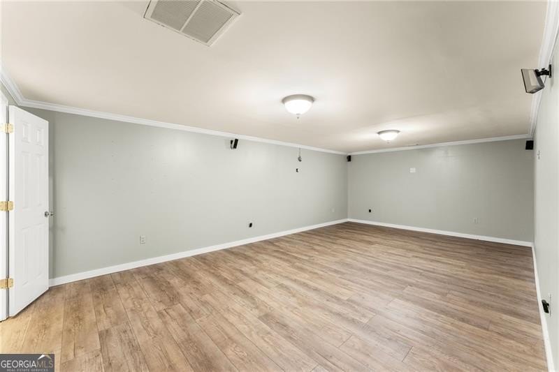 RARE OPPORTUNITY! Set on 4.4 private acres in one of Forsyth - photo 21
