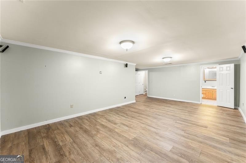 RARE OPPORTUNITY! Set on 4.4 private acres in one of Forsyth - photo 22