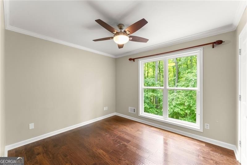 RARE OPPORTUNITY! Set on 4.4 private acres in one of Forsyth - photo 26