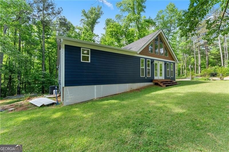 RARE OPPORTUNITY! Set on 4.4 private acres in one of Forsyth - photo 40