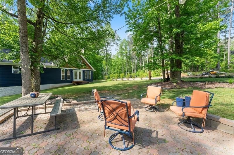RARE OPPORTUNITY! Set on 4.4 private acres in one of Forsyth - photo 42