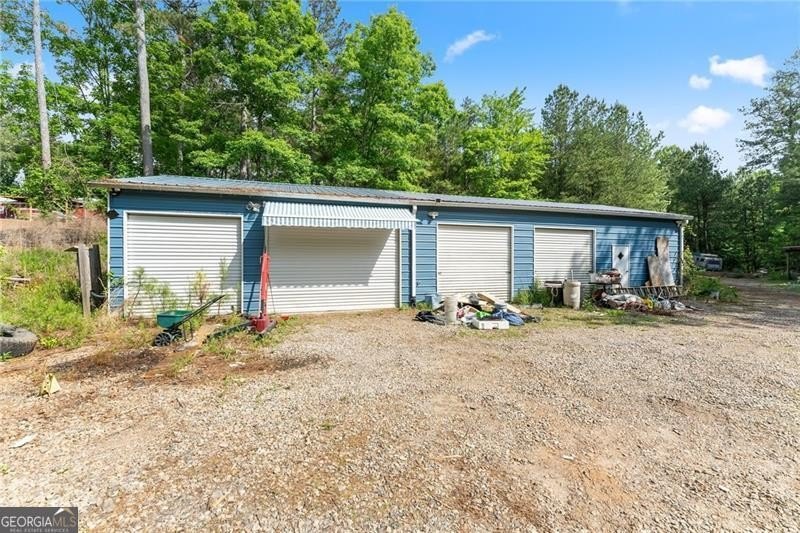 RARE OPPORTUNITY! Set on 4.4 private acres in one of Forsyth - photo 44