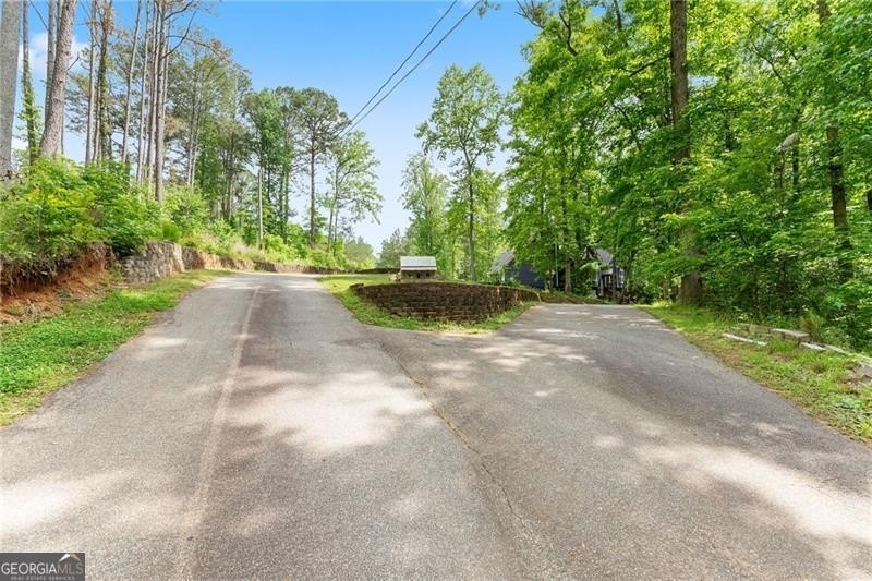 RARE OPPORTUNITY! Set on 4.4 private acres in one of Forsyth - photo 45