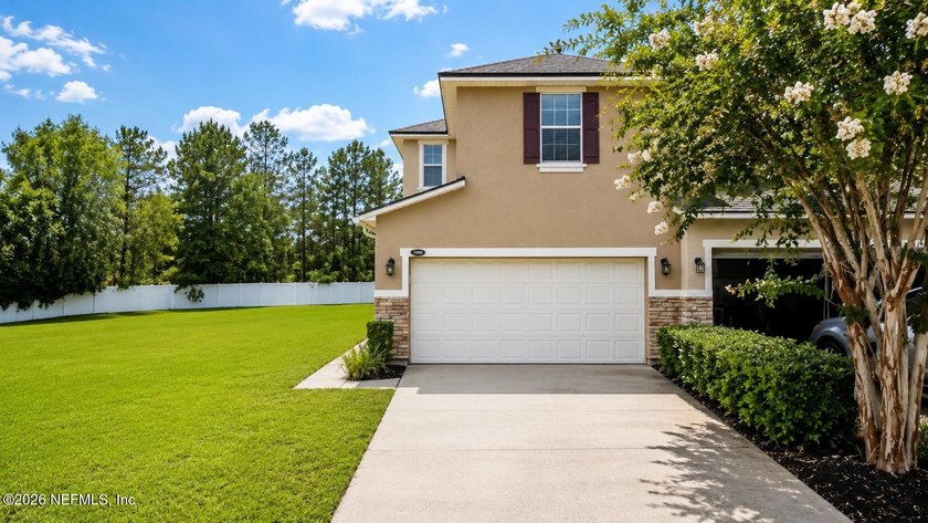Welcome to this beautifully maintained **corner-unit townhome** - photo 5