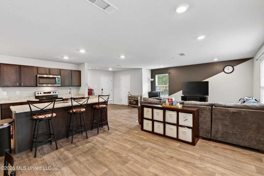 Welcome to this spacious 3-bedroom, 2.5-bath home featuring a - photo 6