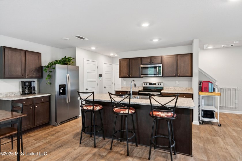 Welcome to this spacious 3-bedroom, 2.5-bath home featuring a - photo 7