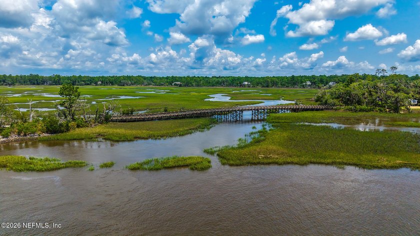 Approximately 1.98-acre wooded homesite located in the gated - photo 22