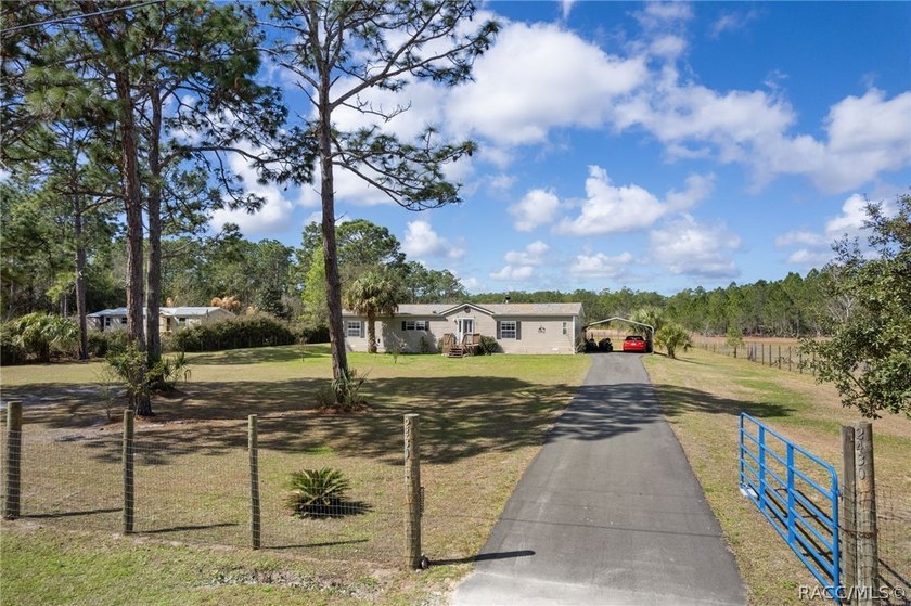 Welcome to peaceful country living! This 3-bedroom, 2-bath home - photo 3