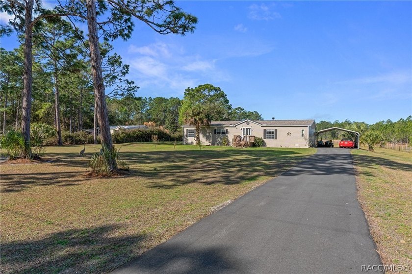 Welcome to peaceful country living! This 3-bedroom, 2-bath home - photo 4