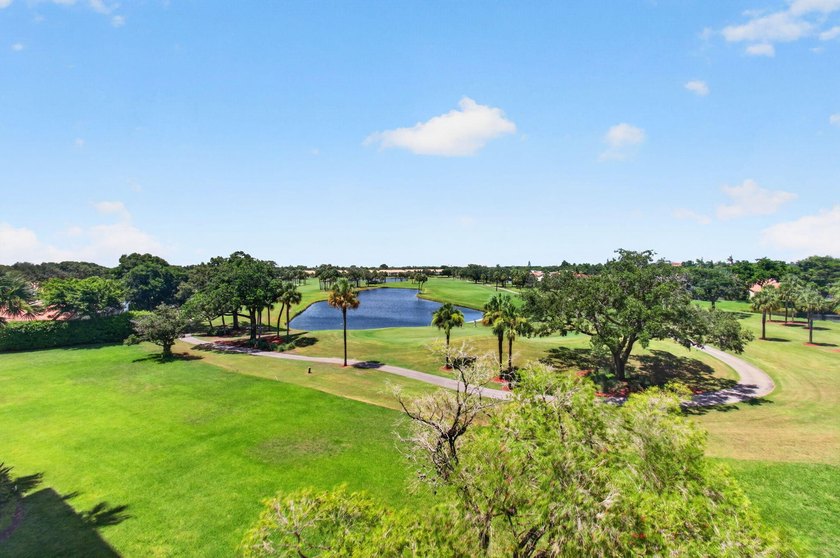 Welcome to Spyglass at Boca Country Club. Bright &amp; beautifully - photo 2