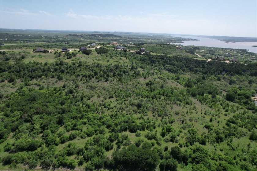 Scenic five acre lot that is level at the street yet rises up - photo 6