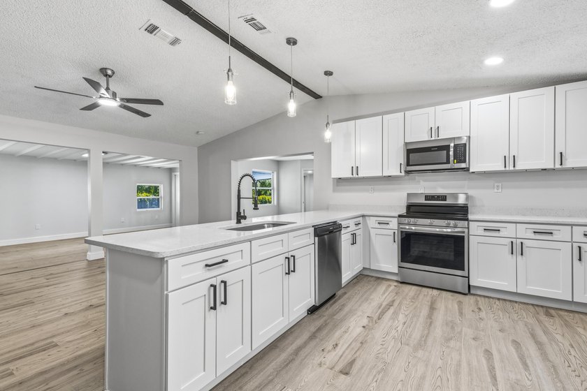 Tastefully renovated and turn-key! This stunning 3BR/2.5BA home - photo 8