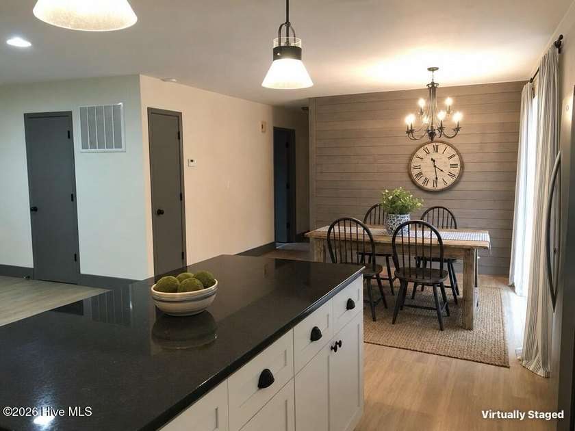 Fresh updates and a modern feel give this renovated 3-bedroom, 1 - photo 11