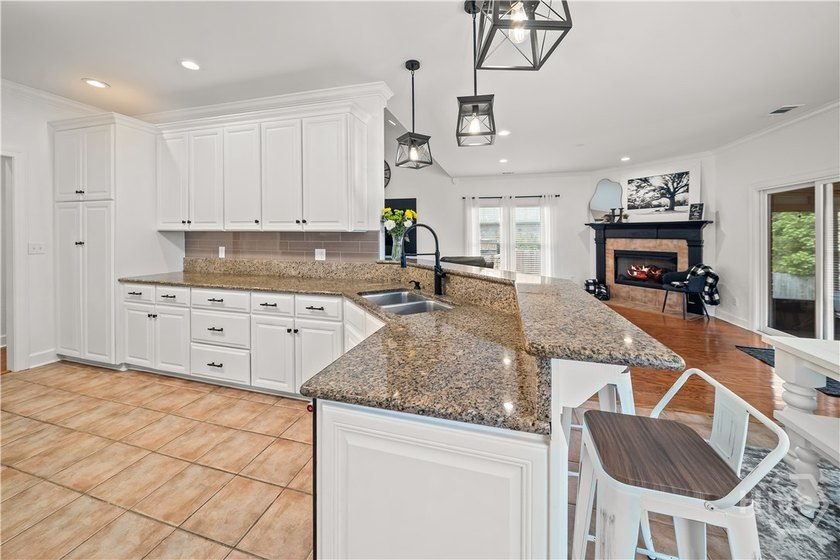 Welcome to this stunning full brick 4-bedroom, 3.5-bath home in - photo 21