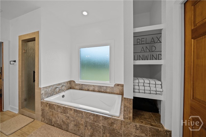 Welcome to this stunning full brick 4-bedroom, 3.5-bath home in - photo 33