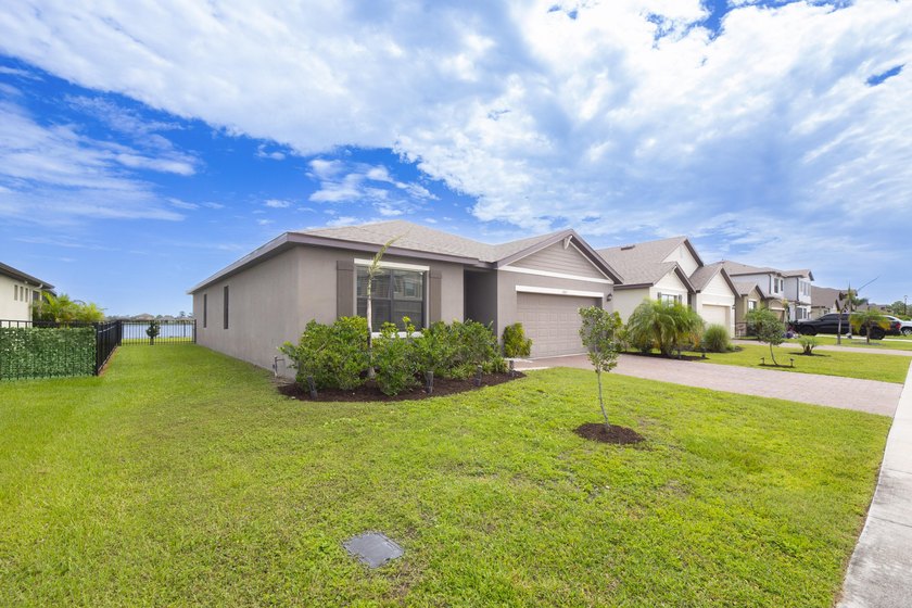 Discover WATERFRONT living in Cypress Bay Preserve! BUILT IN - photo 6