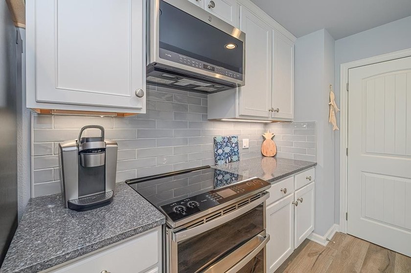 Absolutely stunning! Come experience this completely remodeled - photo 17