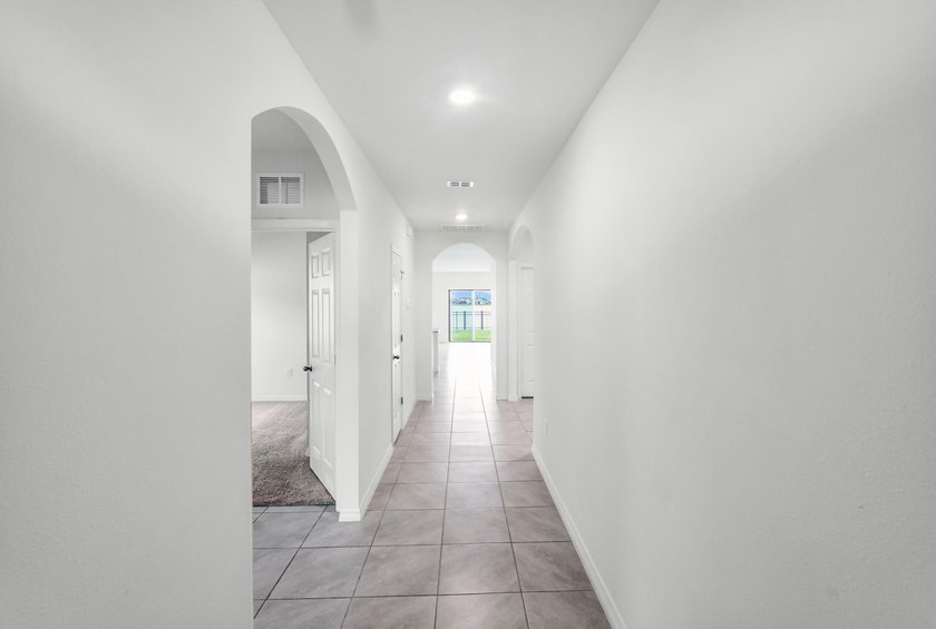 Discover WATERFRONT living in Cypress Bay Preserve! BUILT IN - photo 10