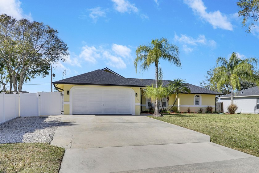 Must see to Believe!! Upgraded 3/2/2 with screened in pool, 2025 - photo 2