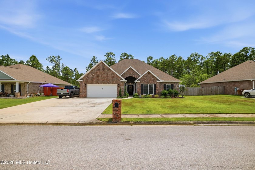 This home has it all! Featuring a spacious open floor plan, this - photo 2