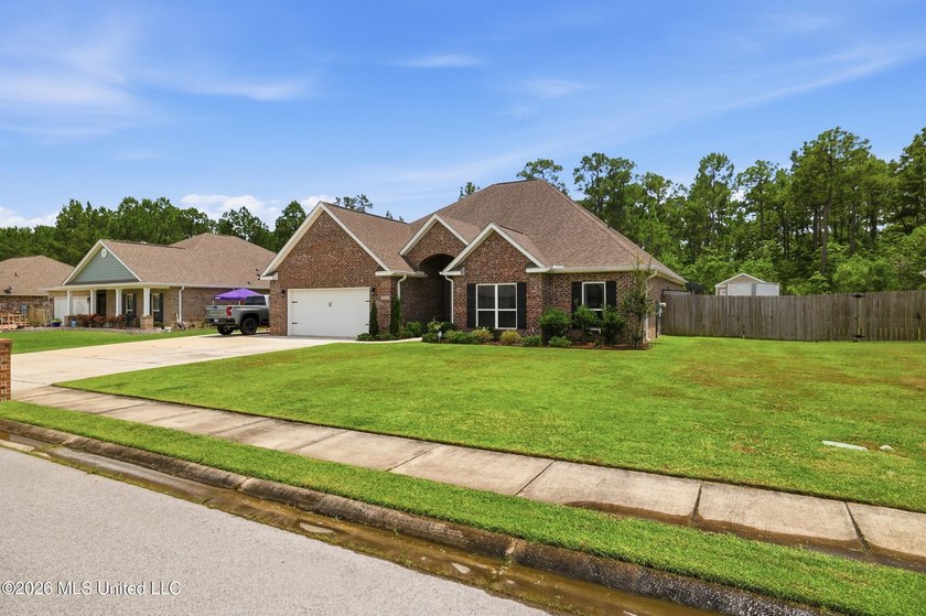 This home has it all! Featuring a spacious open floor plan, this - photo 5