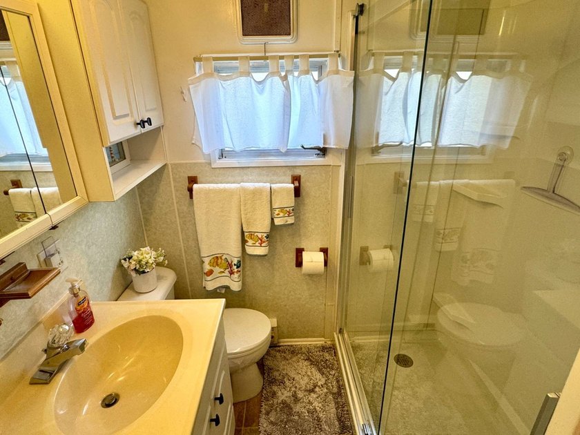 PRICE JUST REDUCED! Charming Updated Mobile Home with Expansion - photo 18