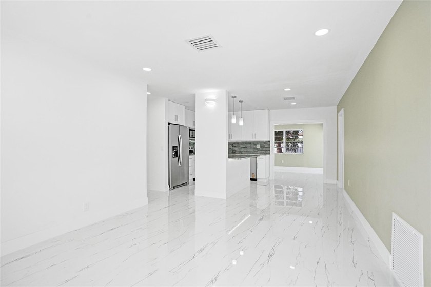 Completely renovated 4-bedroom, 3-bathroom home in desirable - photo 3