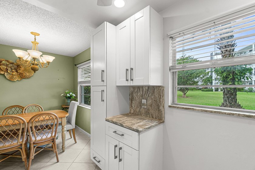 Beautifully updated and meticulously maintained corner first - photo 6