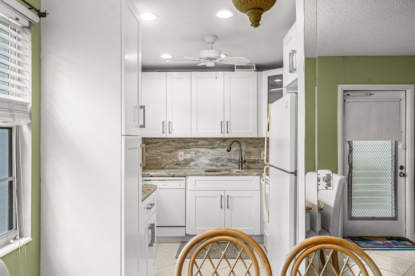 Beautifully updated and meticulously maintained corner first - photo 9