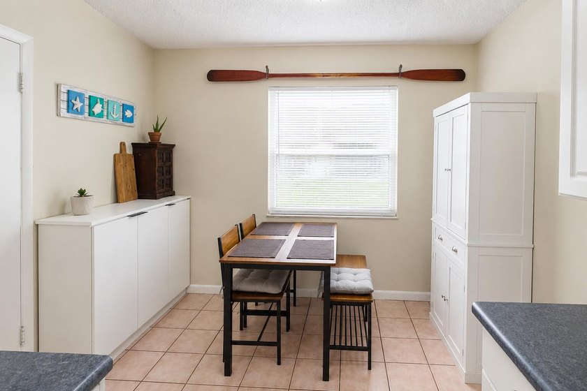 This well-maintained 3-bedroom, 2-bath home offers a bright - photo 9