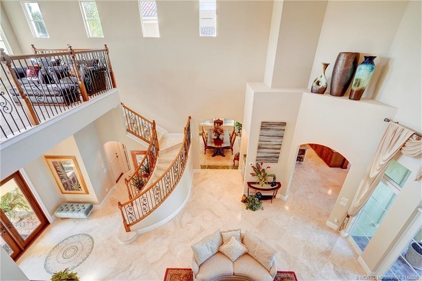 Welcome to this stunning Tuscan-inspired estate featuring an - photo 5