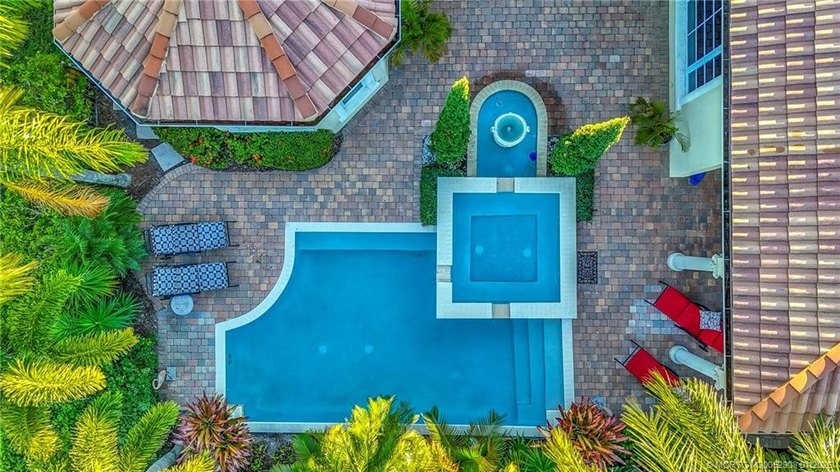 Welcome to this stunning Tuscan-inspired estate featuring an - photo 6