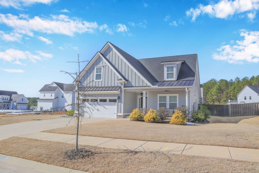 Experience elevated living in this 4/5 bedroom, 4 full bath home - photo 4