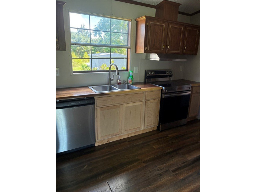 This inviting 3 bed, 2 bath country home offers a lifestyle - photo 3