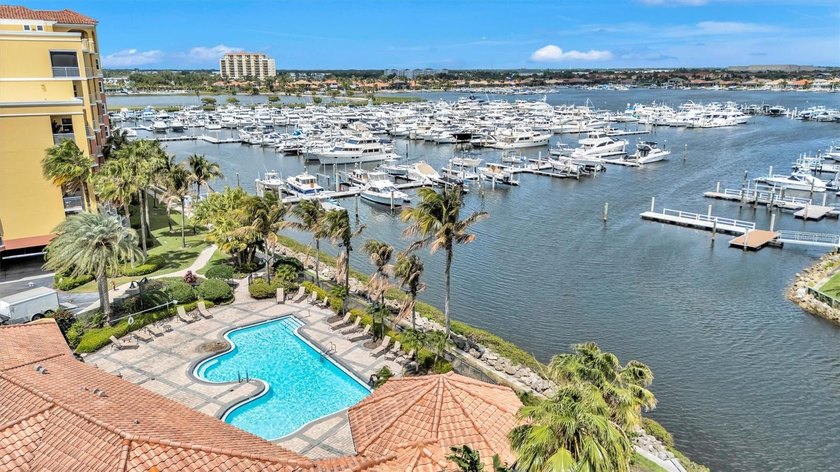 RARELY AVAILABLE WATERFRONT CORNER RESIDENCE WITH TWO PRIVATE - photo 31