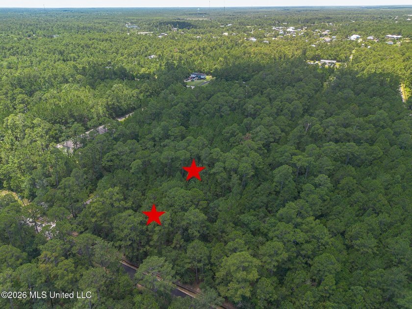 Undeveloped 2 lots with separate parcels must be sold together - - photo 2