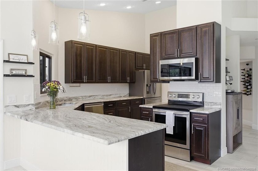 Experience privacy and luxury in one of Palm City's most - photo 21