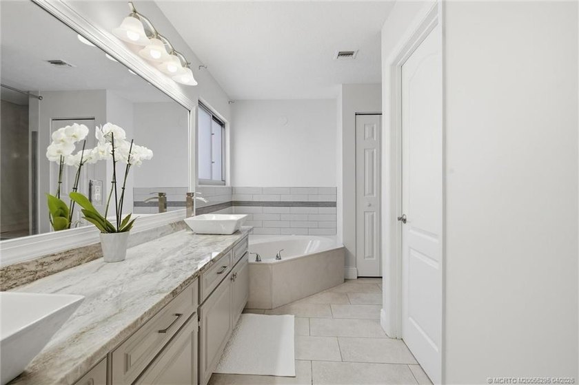 Experience privacy and luxury in one of Palm City's most - photo 39