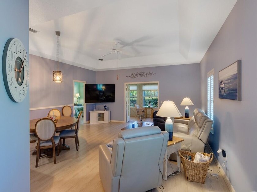 Located on the 5th tee at Gator Trace CC, this beautiful villa - photo 8