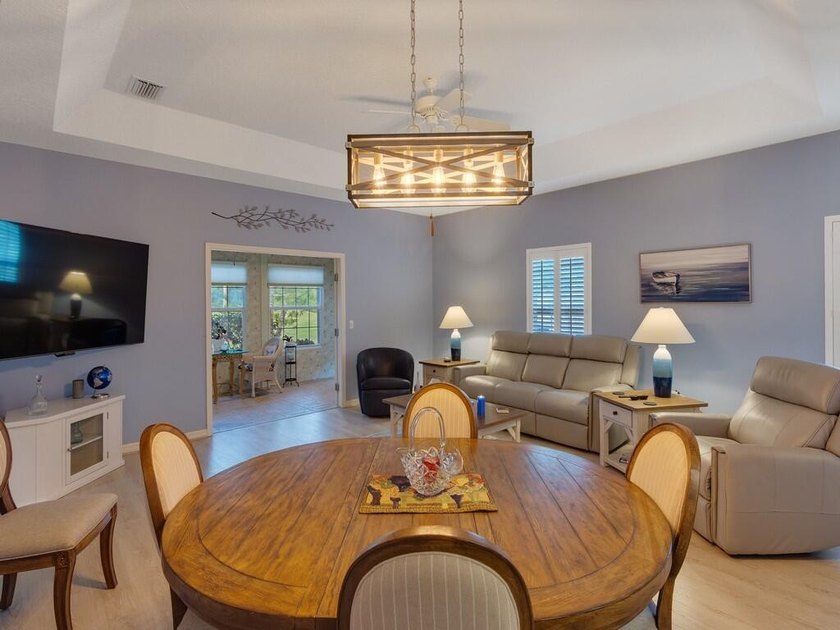 Located on the 5th tee at Gator Trace CC, this beautiful villa - photo 9