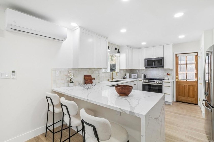 Rare opportunity to own a fully remodeled property in the heart - photo 11