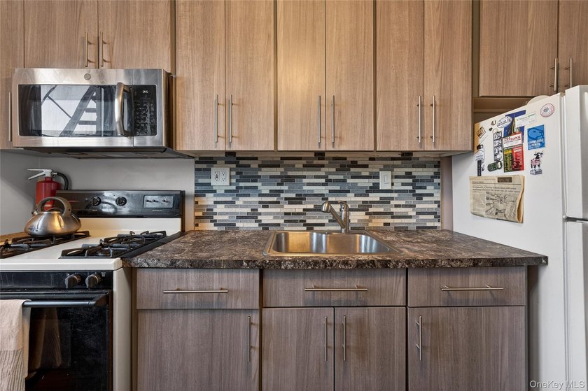Welcome to Linden Hill. This bright corner one-bedroom co-op - photo 8