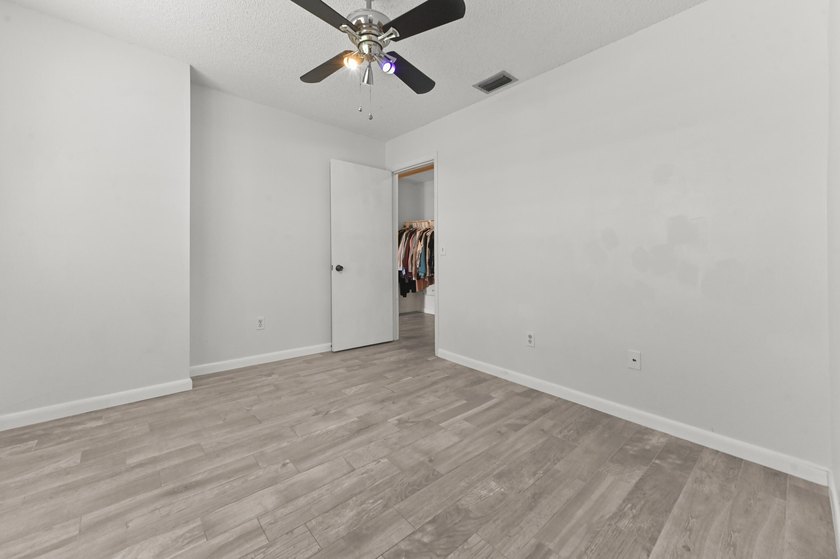 Welcome to 84 Conaskonk Circle in Royal Palm Beach, a bright and - photo 9