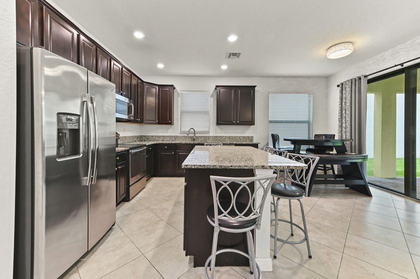 Welcome to 8899 Willow Cove Lane, a beautifully designed - photo 10